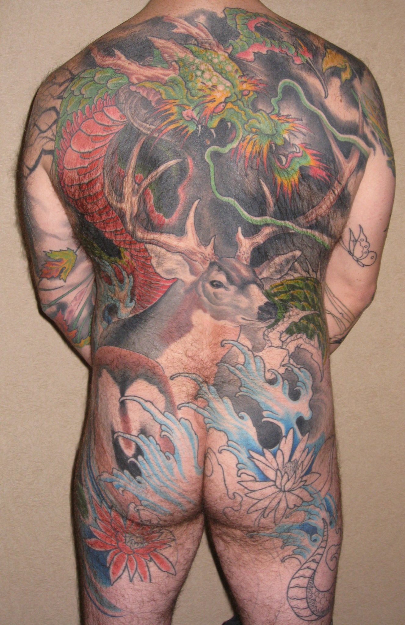 Dragon and Deer Tattoo by Matt Rousseau